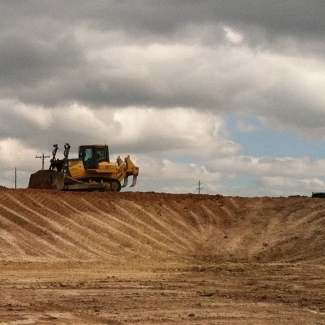 John Deere 950J Frac Pit